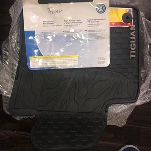 VW Tiguan OEM 3 Piece Monster Floor Mats driver side,Front, Rear Black Rubber.